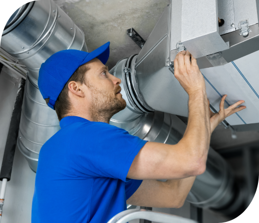 hvac worker in blue installing